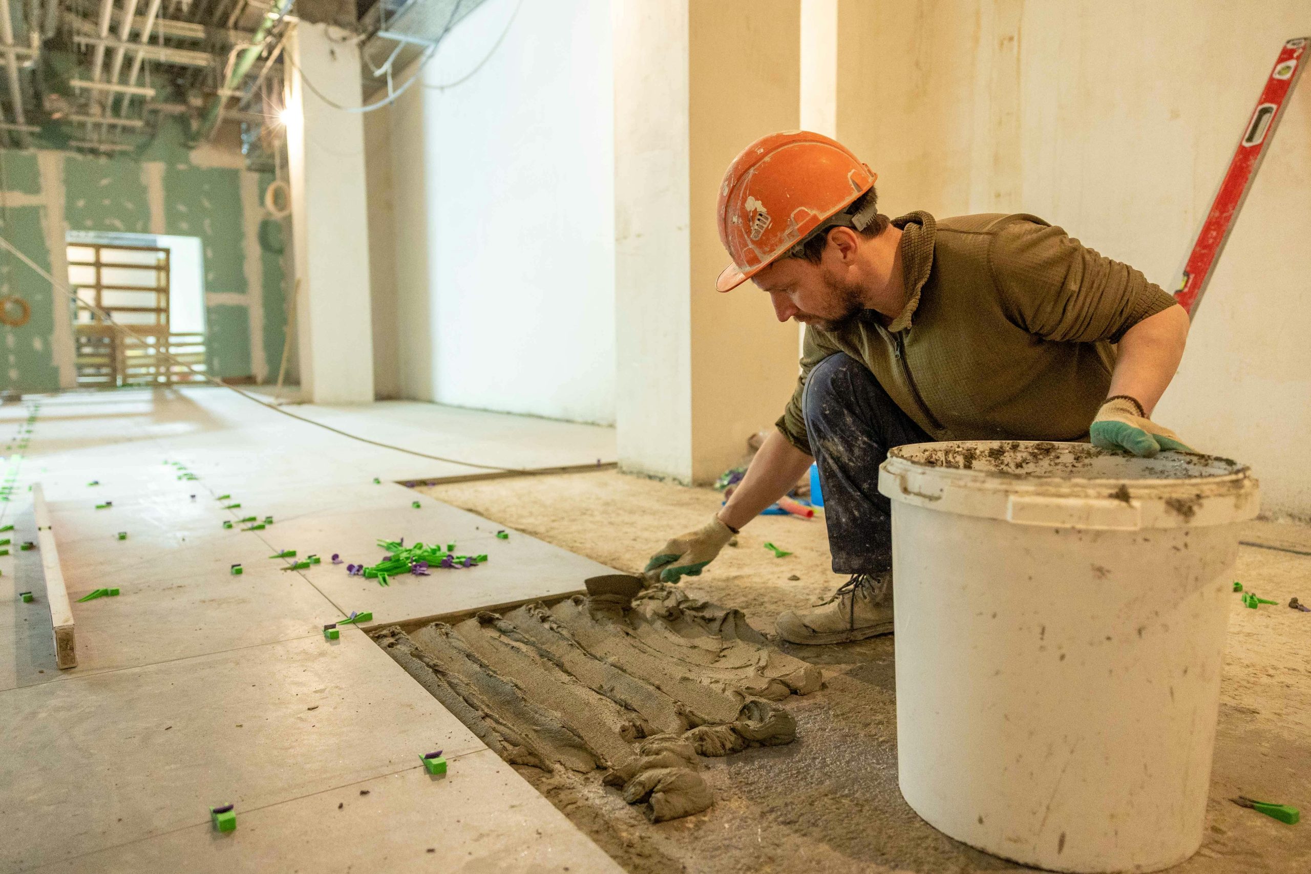 Man working on tile 